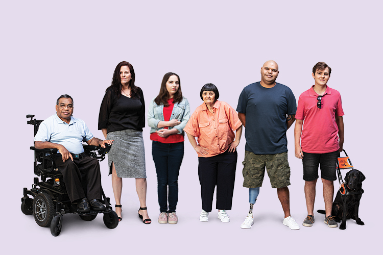 People standing in line against mauve background, some with visible disability, including someone with an assistance dog