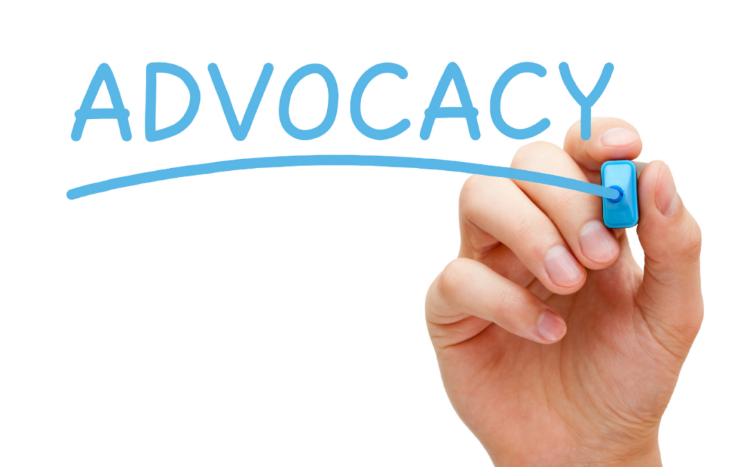 Image of hand underlining the word ADVOCACY